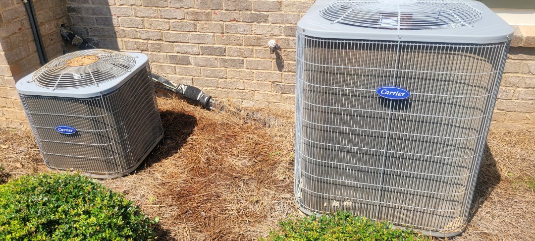 Marietta, GA - Performed AC Maintenance on Carrier Condensing Units and removed all debris from bottom of condensing Units.  Marietta 