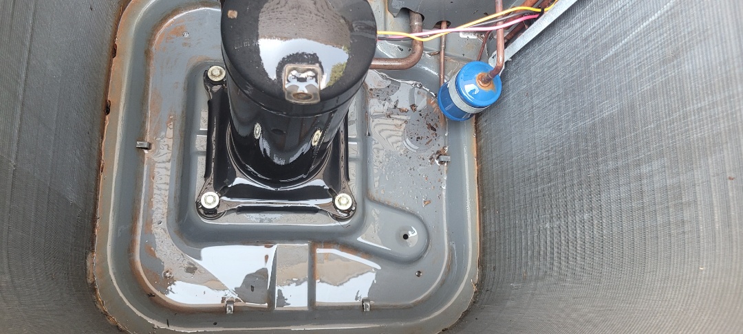 Marietta, GA - Performed AC Maintenance on Carrier Condensing Units and removed all debris from bottom of condensing Units.  Marietta 