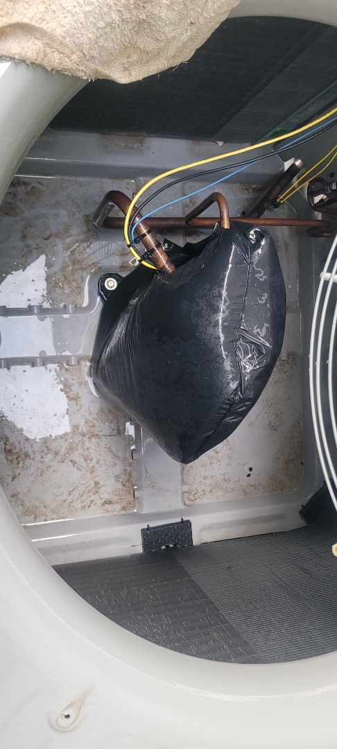 Marietta, GA - Performed AC Maintenance on a High Efficiency Carrier Infinity Condensing Unit and removed all debris from bottom of condensing unit.  Marietta 