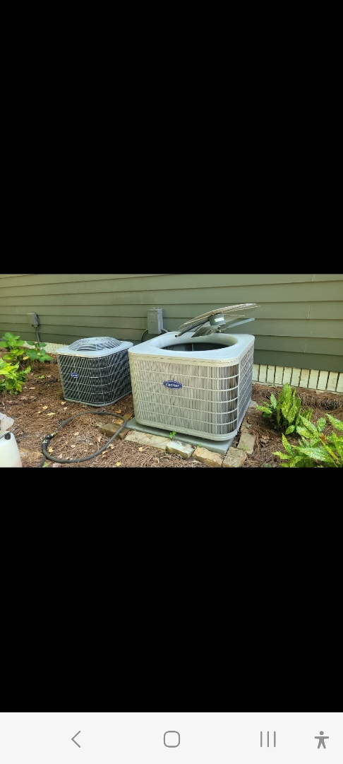 Marietta, GA - Performed AC Maintenance on 2 Carrier Condensing Units and removed all debris from bottom of condensing Units.  Marietta 