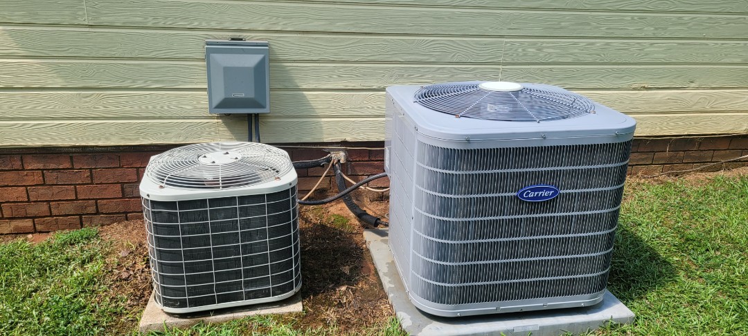 Smyrna, GA - Performed AC Maintenance on a Carrier and a Bryant Condensing Units and removed all debris from bottom of condensing Units.  Smyrna 