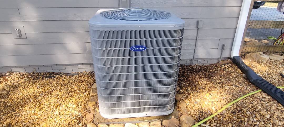 Marietta, GA - Performed AC Maintenance on a Carrier Condensing Unit and removed all debris from bottom of condensing unit.  Marietta 