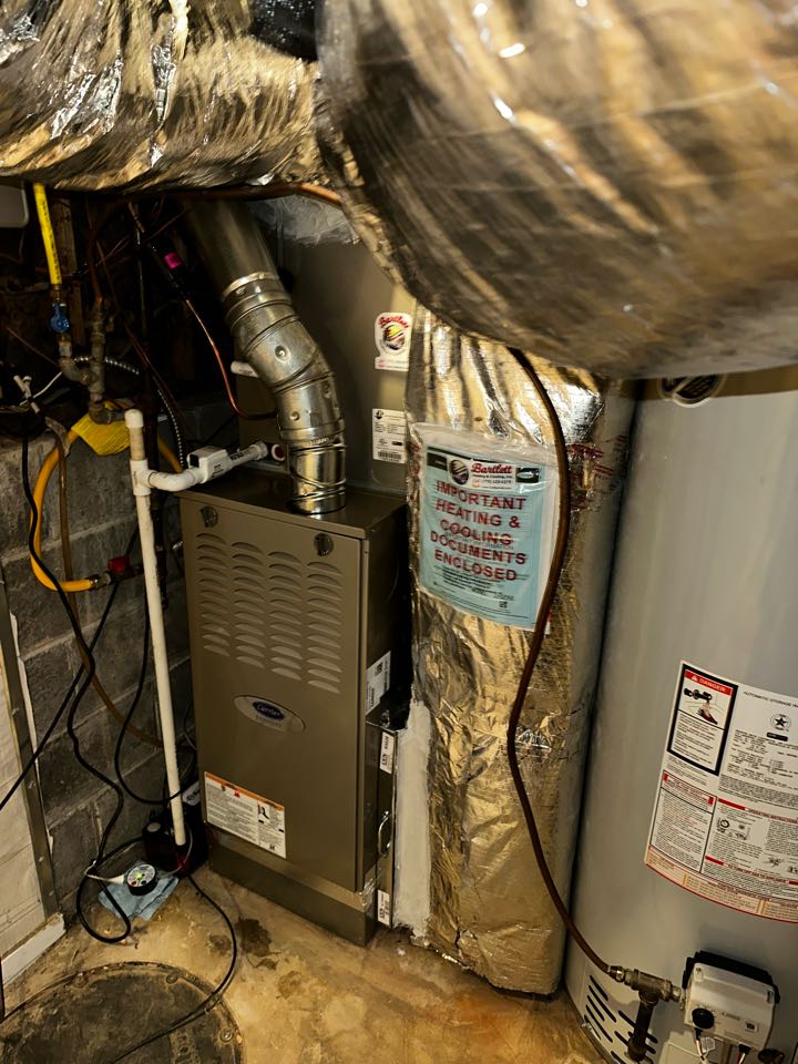 Marietta, GA - Replaced existing mechanical system with new Carrier 4 ton air conditioner with matching evaporator coil. New Carrier Infinity furnace. Left existing zone system as is. Replaced both thermostats with new Emerson programmable. Installed new 20x25 filter rack. Installed wet switch because old drain pan was rusted out, and was not able to get new one in place. Pressure tested and charged AC with 410A refrigerant. Checked Delta T. System is working as needed.