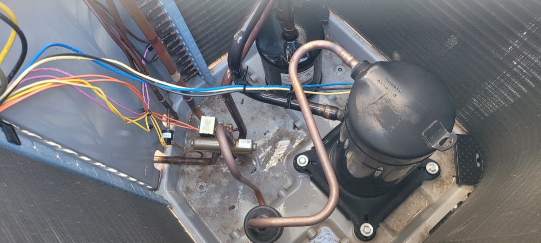 Marietta, GA - Performed AC Maintenance on 1 Carrier HP and Carrier Condensing Units and removed all debris from bottom of condensing Units.  Marietta 