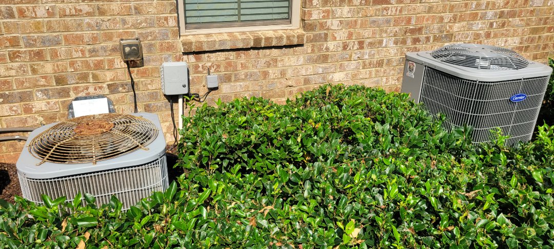 Marietta, GA - Performed AC Maintenance on 1 Carrier HP and Carrier Condensing Units and removed all debris from bottom of condensing Units.  Marietta 