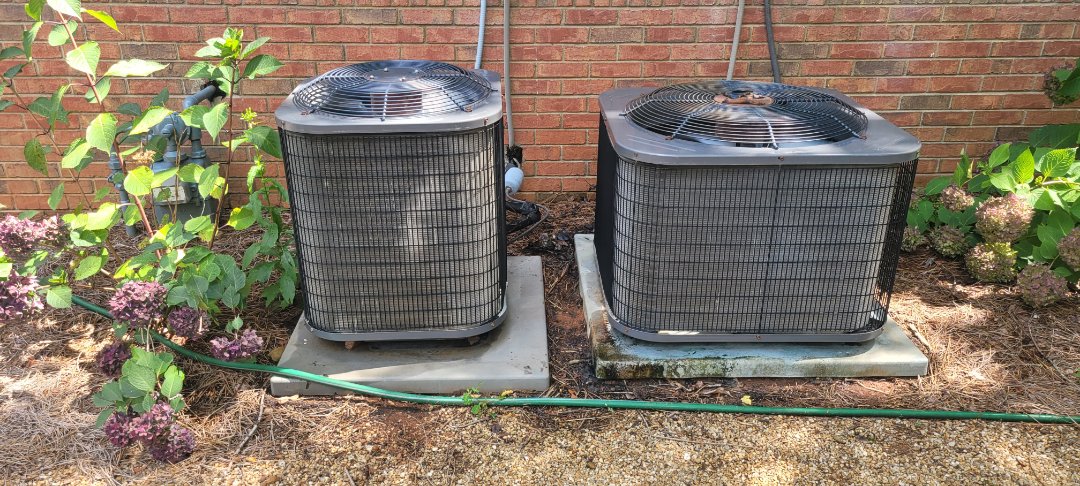 Marietta, GA - Performed AC Maintenance on 2 Arcoaire condensing units and removed all debris from bottom of condensing Units.  Marietta 