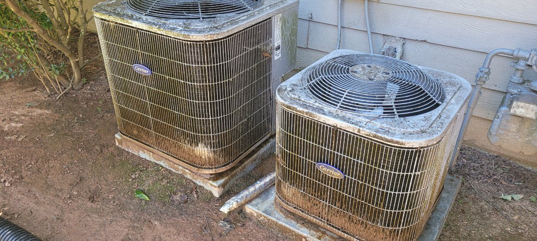 Marietta, GA - Performed AC Maintenance on 2 Carrier Condensing Units and removed all debris from bottom of condensing Units.  Marietta 