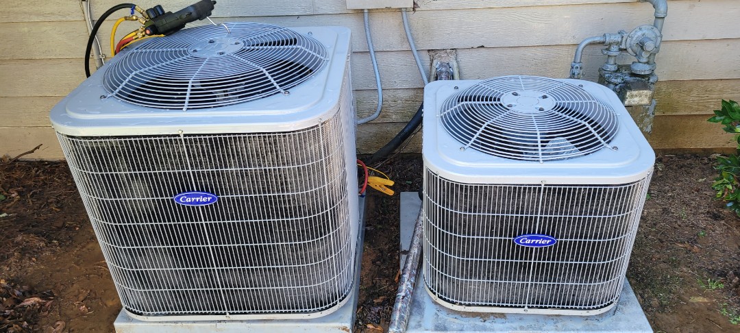 Marietta, GA - Performed AC Maintenance on 2 Carrier Condensing Units and removed all debris from bottom of condensing Units.  Marietta 