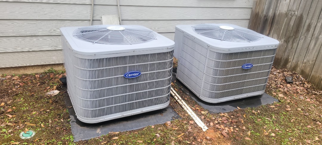 Smyrna, GA - Performed AC Maintenance on 2 Carrier Condensing Units and removed all debris from bottom of condensing Units.  Smyrna