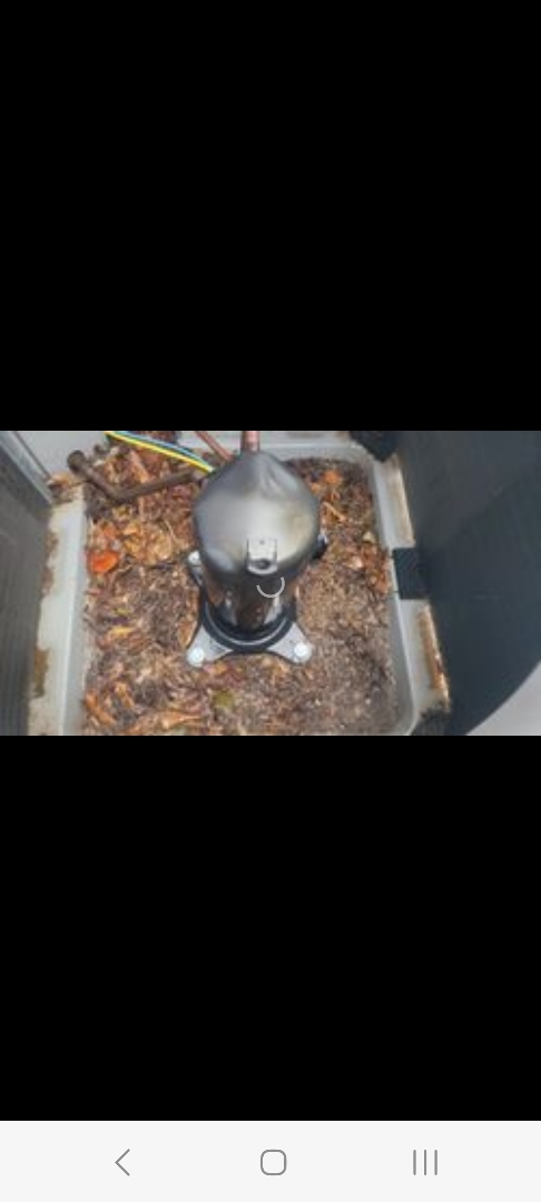 Smyrna, GA - Performed AC Maintenance on a Carrier and a Goodman Condensing Units and removed all debris from bottom of condensing units. Smyrna 