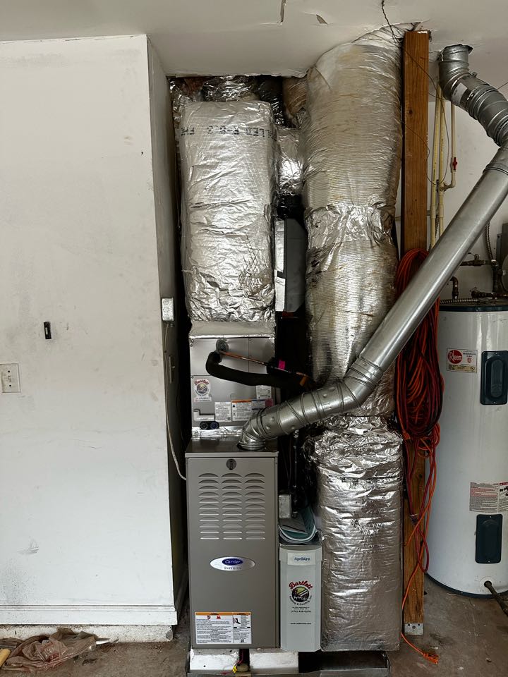 Marietta, GA - Replaced existing mechanical system with new Carrier Infinity Furnace. Carrier 2.5 ton condenser with matching evaporator coil. Installed Aprilaire filter rack. Installed fan powered humidifier. Replaced supply and return plenums. System is heating and cooling as needed. Thank you for choosing Bartlett Heating and Cooling. 