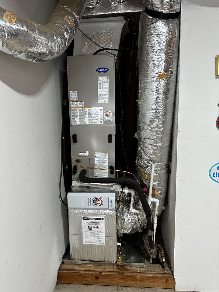 Smyrna, GA - Replaced existing mechanical system serving the basement and main floor. Installed new Carrier heat pump with matching air handler. Installed Aprilaire filter rack. Installed Emerson thermostat. Tested system in heat and cool. System is working as needed. Thank you for choosing Bartlett Heating and Cooling. 