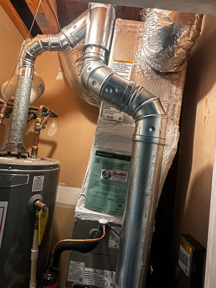Marietta, GA - Replaced existing mechanical system with new Carrier Weathermaker equipment. Replaced thermostat with new Emerson thermostat. Installed external 16x25x1 filter rack. Replaced existing drain line with new 3/4 pvc pipe. Replaced single wall flue pipe with double wall. Set gas pressures and charged air conditioner. System is working as needed. Thank you for choosing Bartlett Heating and Cooling. 