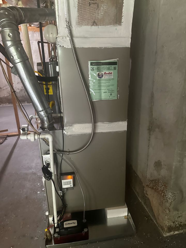 Marietta, GA - Replaced existing mechanical system serving the main floor. Installed new Aprilaire filter rack. Transitioned supply and return plenum for better airflow. Set gas pressures and charged air conditioner. Replaced all single wall flue pipe with double wall. System is working as needed. Thank you for choosing Bartlett Heating and Cooling. 