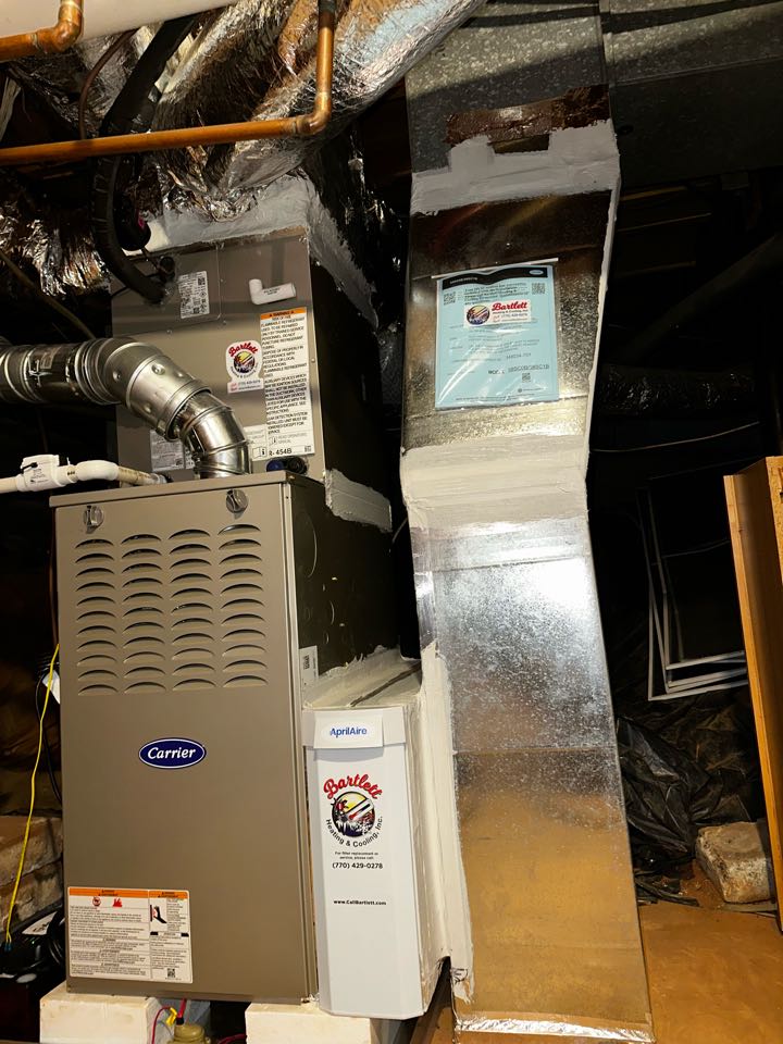 Marietta, GA - Replaced existing mechanical system serving the front of the house. Replaced return and supply plenum. Transitioned to existing duct work. Installed Aprilaire filter cabinet. Set gas pressures and charged air conditioner. System is working as needed. Thank you for choosing Bartlett Heating and Cooling. 