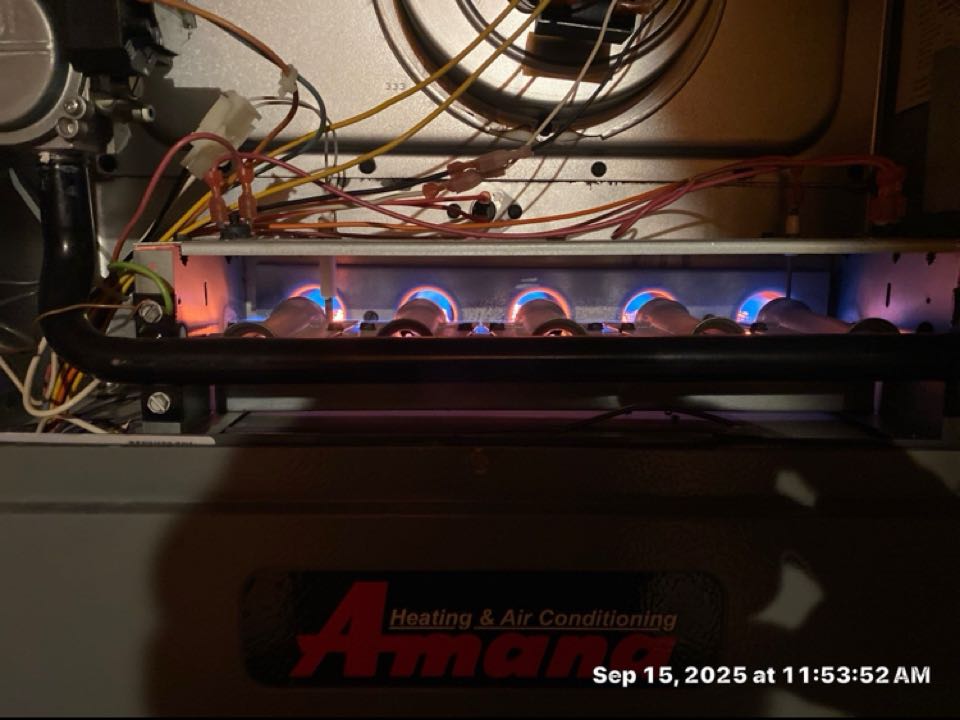 Amana gas furnace heat inspection with filter replacement.