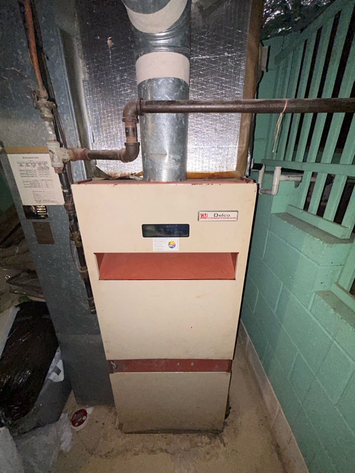 HVAC heating maintenance on Delco furnace in Forest Hills Smyrna. 