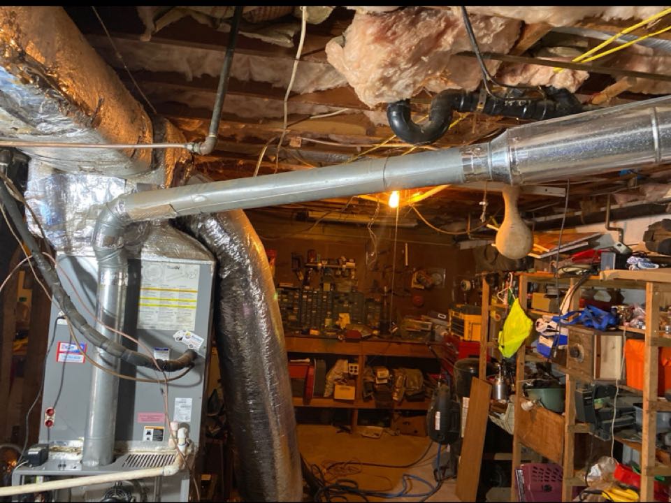 Single wall flue pipe needs replaced per code requirements.