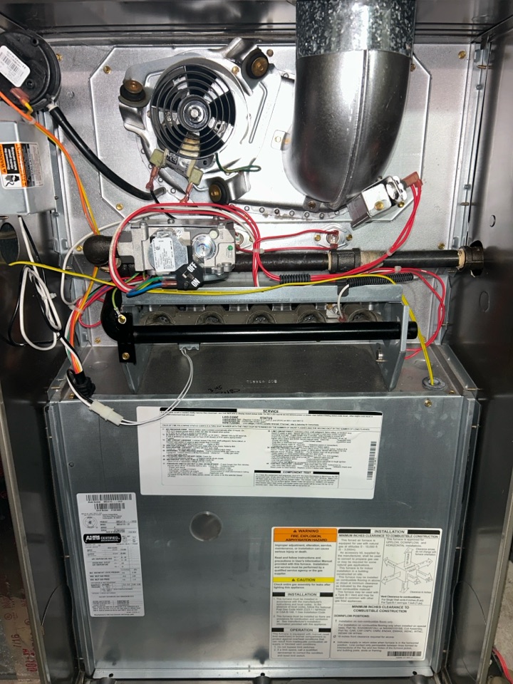 HVAC heating maintenance on Carrier furnace in Smyrna. 