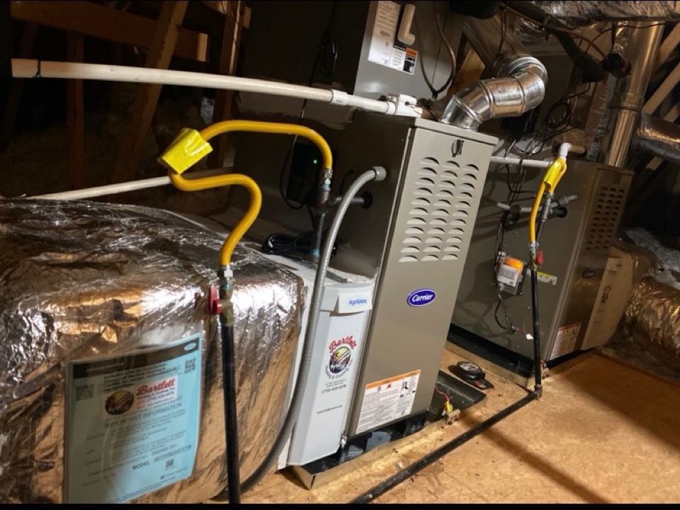 Carrier gas furnaces with media filters and UV air purifiers.