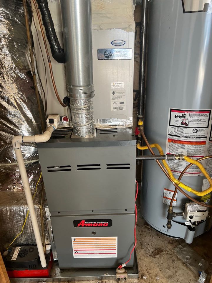 Inspecting amana furnace 