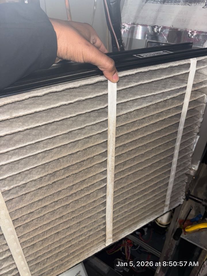 Smyrna, GA - Heating maintenance on 90% efficiency furnace. 