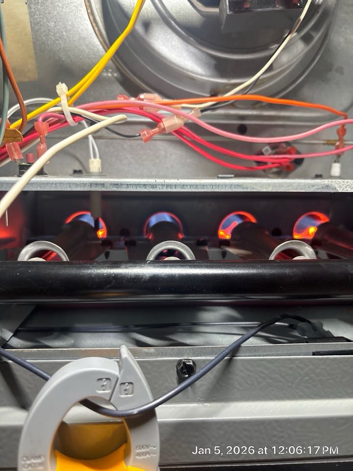 Heating maintenance on Amanda gas furnace. 