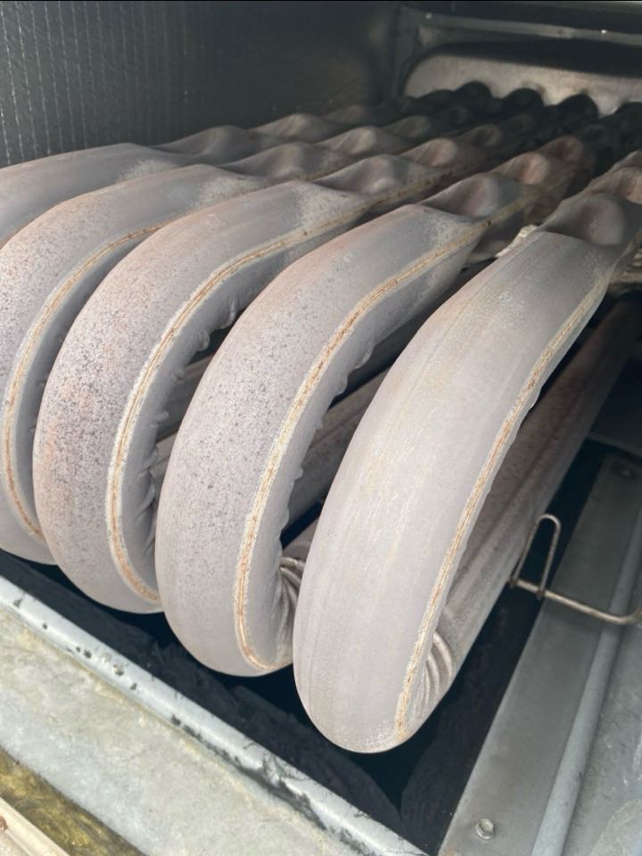 RTU heat exchanger inspected during commercial Heat maintenance and filters replaced.