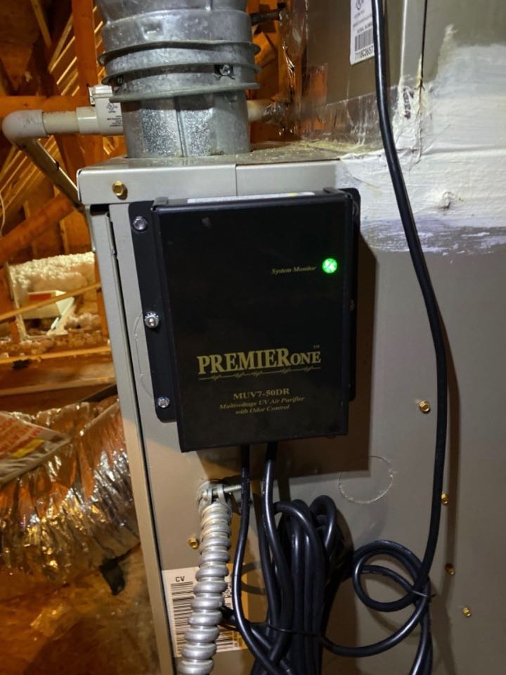 UV germicidal air purifier installed during gas furnace heat maintenance. Providing cleaner and healthier indoor air quality.