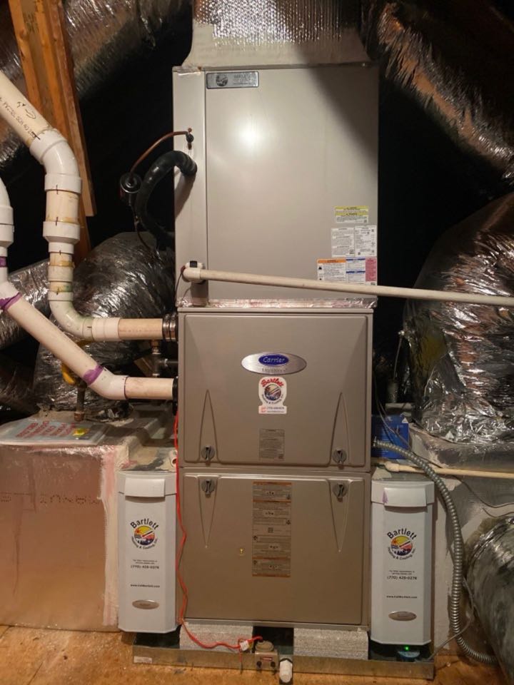 Carrier high efficiency gas furnace with Aprilaire media filters and ionizer air purifier. Heat maintenance 