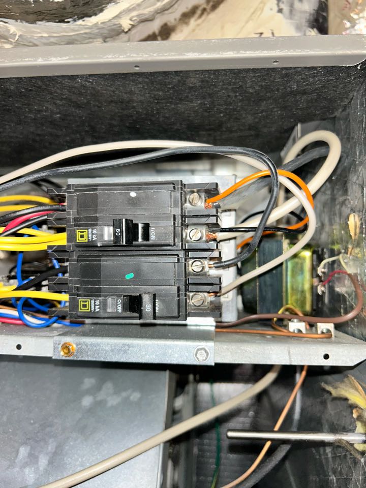 HVAC heating maintenance on Lennox heat pump and air handler in Marietta.