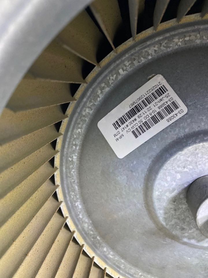 Dirty indoor blower wheel in need of chemical cleaning. Heat pump system.