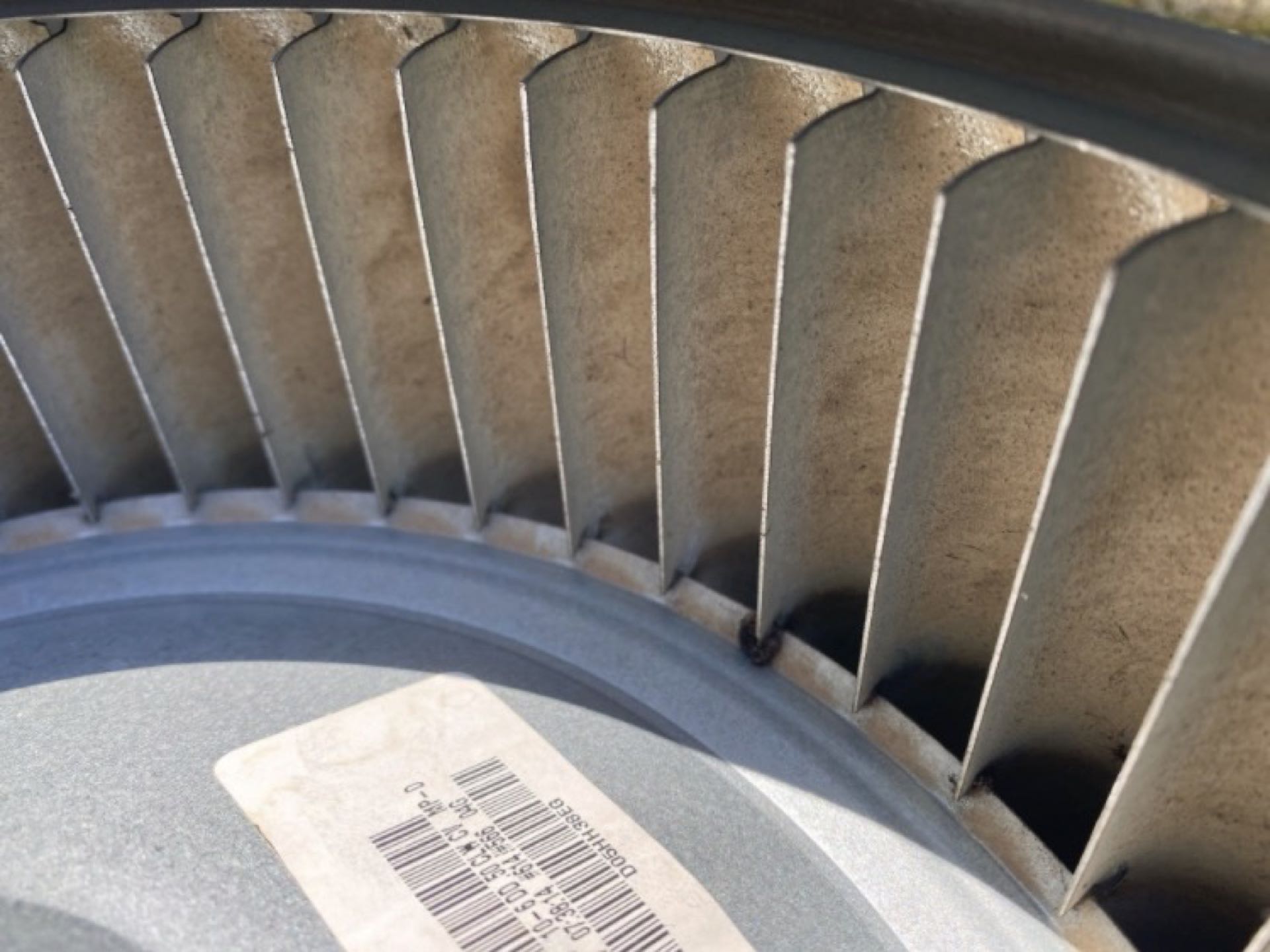 Smyrna, GA - Chemical cleaned blower assembly and wheel, before and after.