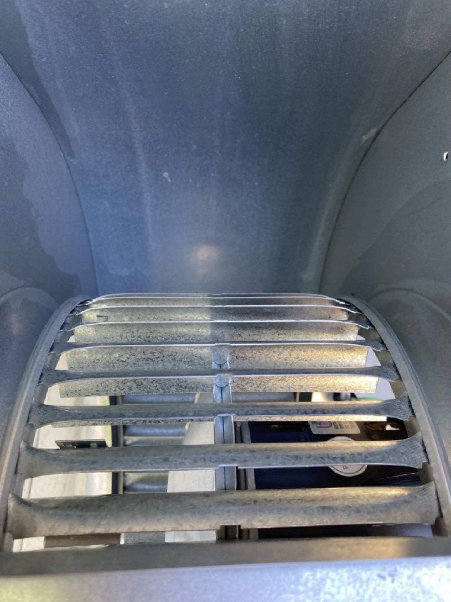 Smyrna, GA - Chemical cleaned blower assembly and wheel, before and after.