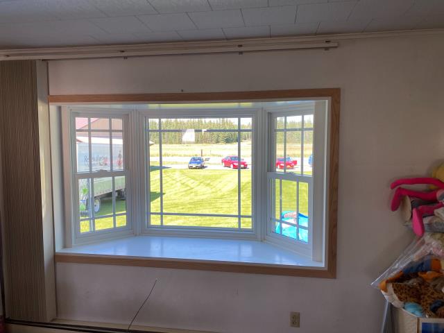 Delta Junction, AK - We got to update this customer's window to a bay window with prairie grilles because the original was not energy efficient and 35 years old! Delta Junction, AK - We got to update this customer's window to a bay window with prairie grilles because the original was not energy efficient and 35 years old!