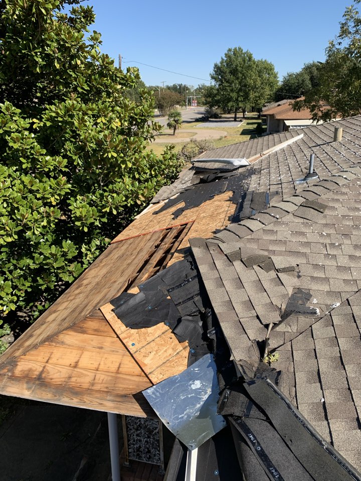 Dallas, TX - Our customer’s home was effected by the tornado. Insurance felt that only the area directly impacted by trees needed repairs. We worked with our customer’s insurance to show that the entire roof was compromised and got insurance to agree to replace his entire roof, as well as all of his gutters, fence, window screens and many windows. Dallas, TX - Our customer’s home was effected by the tornado. Insurance felt that only the area directly impacted by trees needed repairs. We worked with our customer’s insurance to show that the entire roof was compromised and got insurance to agree to replace his entire roof, as well as all of his gutters, fence, window screens and many windows.