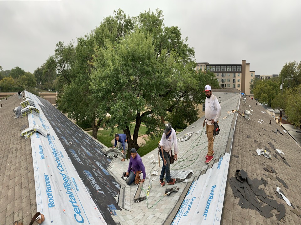 Dallas, TX - We’re replacing the roof of our customer’s large condo complex. It’s a 250 square job. Combination of 30 year architectural laminate shingle and rolled modified bitumen roofing. Because of the unpredictable weather lately we are removing and replacing in sections. Dallas, TX - We’re replacing the roof of our customer’s large condo complex. It’s a 250 square job. Combination of 30 year architectural laminate shingle and rolled modified bitumen roofing. Because of the unpredictable weather lately we are removing and replacing in sections.