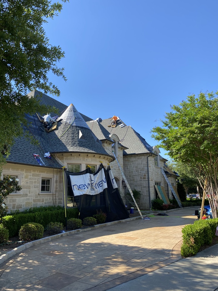 Frisco, TX - New View crew working hard on a new GAF Roof replacement in the Frisco Tx area due to recent wind and hail damage. In addition to the roof, the insurance covered new gutters, fence staining, and some window treatment. Everything was covered by Allstate Insurance Frisco, TX - New View crew working hard on a new GAF Roof replacement in the Frisco Tx area due to recent wind and hail damage. In addition to the roof, the insurance covered new gutters, fence staining, and some window treatment. Everything was covered by Allstate Insurance