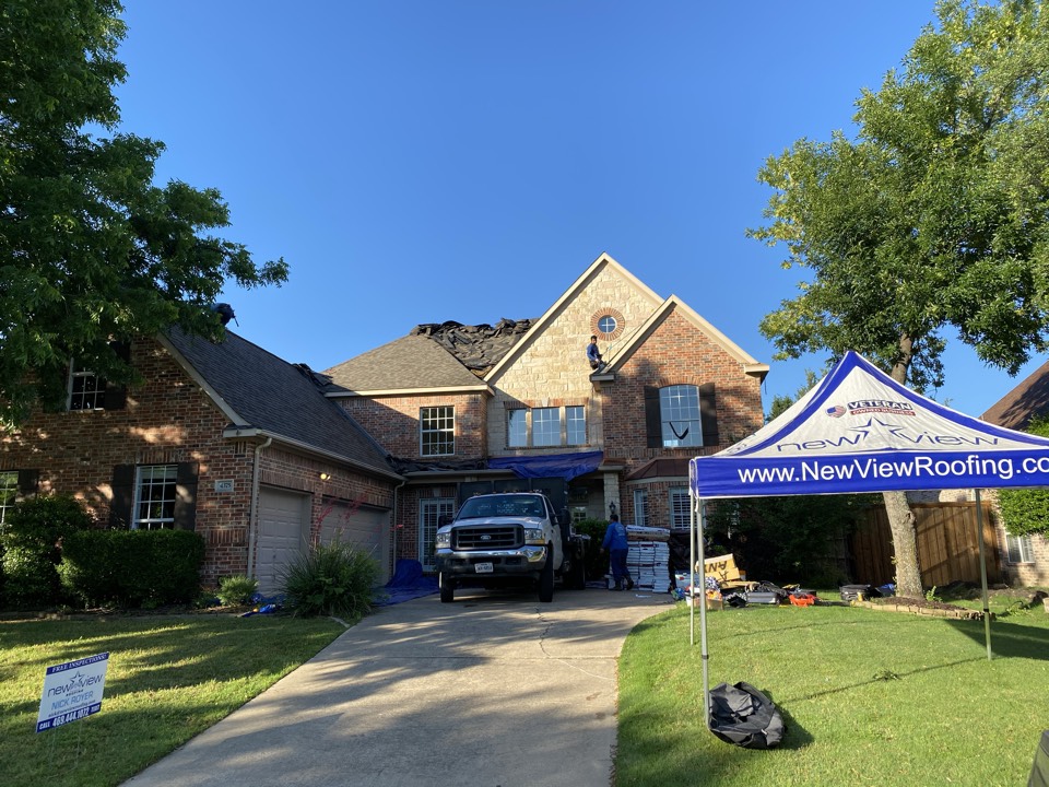 Frisco, TX - New View crew working hard on a new GAF Roof replacement in the Frisco Tx area due to recent wind and hail damage. In addition to the roof, the insurance covered new gutters, fence staining, and some window treatment. Everything was covered by Nationwide Insurance. Frisco, TX - New View crew working hard on a new GAF Roof replacement in the Frisco Tx area due to recent wind and hail damage. In addition to the roof, the insurance covered new gutters, fence staining, and some window treatment. Everything was covered by Nationwide Insurance.
