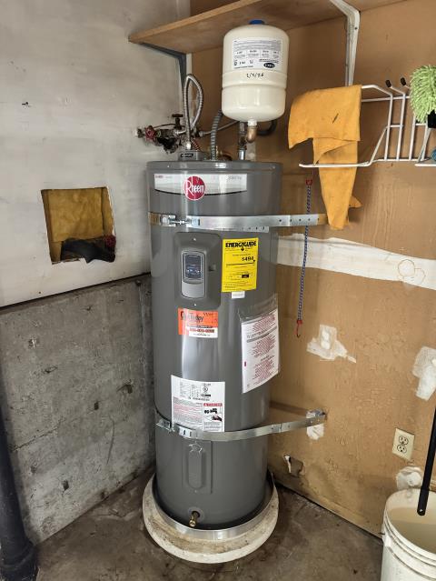 I installed a new high-efficiency water heater, ensuring proper venting and connections. The unit was securely mounted, and all safety checks were completed before testing the system.
