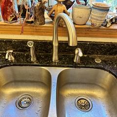 We installed a modern, high-efficiency kitchen faucet, ensuring a seamless fit and optimal water flow. The job was completed with precision and care.