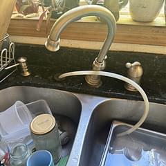 We installed a modern, high-efficiency kitchen faucet, ensuring a seamless fit and optimal water flow. The job was completed with precision and care.