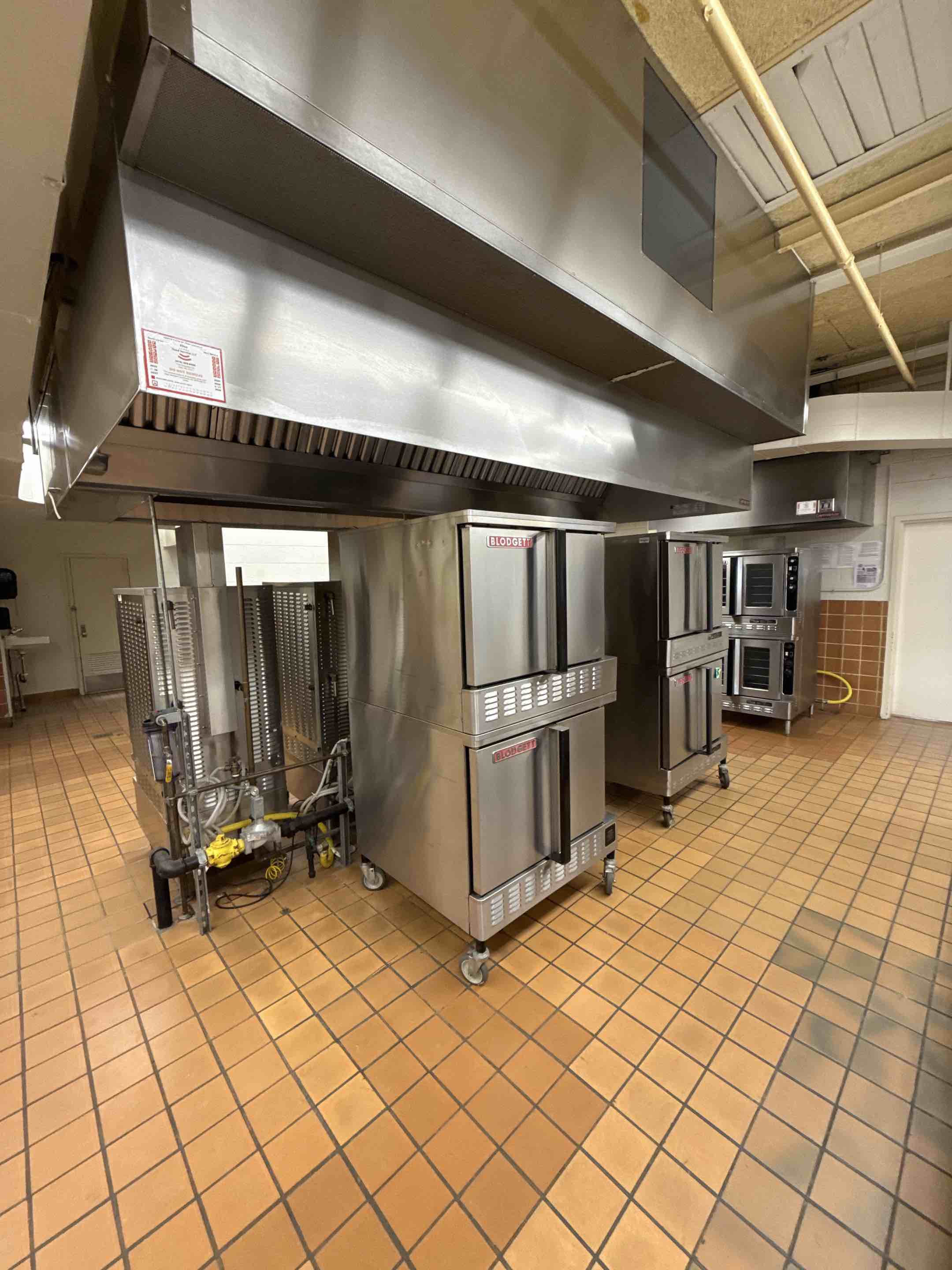 A thorough kitchen hood cleaning was executed, starting with a comprehensive inspection to identify areas with heavy grease accumulation. Specialized cleaning agents were applied to dissolve and loosen s
