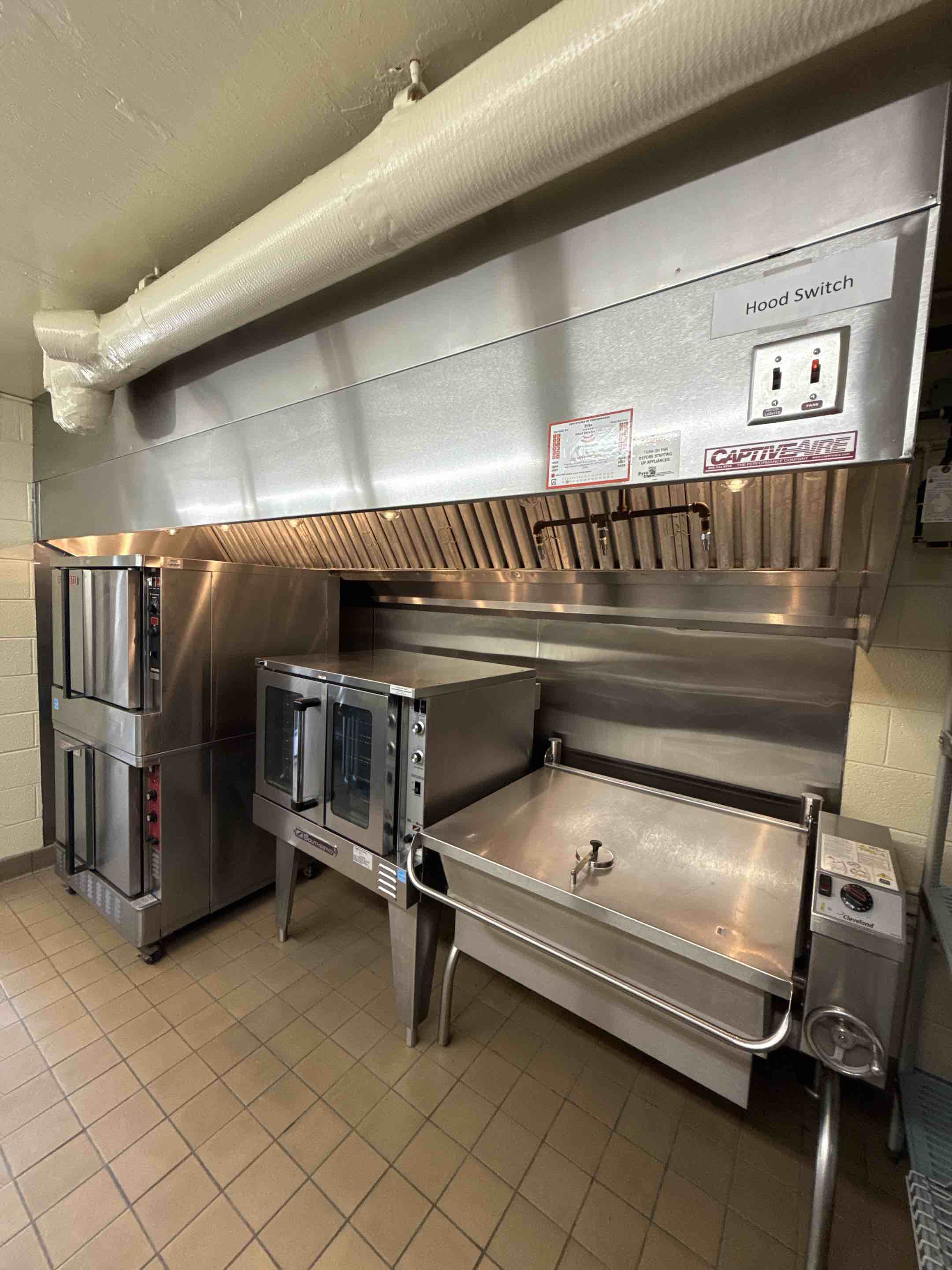 A thorough kitchen hood cleaning was performed, starting with a comprehensive inspection to identify areas requiring special attention. The hood's exterior and interior surfaces were meticulously wiped down using eco-friendly cleaning agents to ensure no residue was left behind. Grease and grime buildup were targeted with specialized solvents, ensuring all contaminants were removed. The grease filters were carefully removed, cleaned, and sanitized to restore their effectiveness. The motor and fan blades were inspected for any obstructions and cleaned to ensure optimal performance. After cleaning, the hood was reassembled, and a final inspection was conducted to confirm that all areas were spotless and functioning correctly. This detailed process ensures the kitchen hood operates efficiently and maintains a hygienic environment.