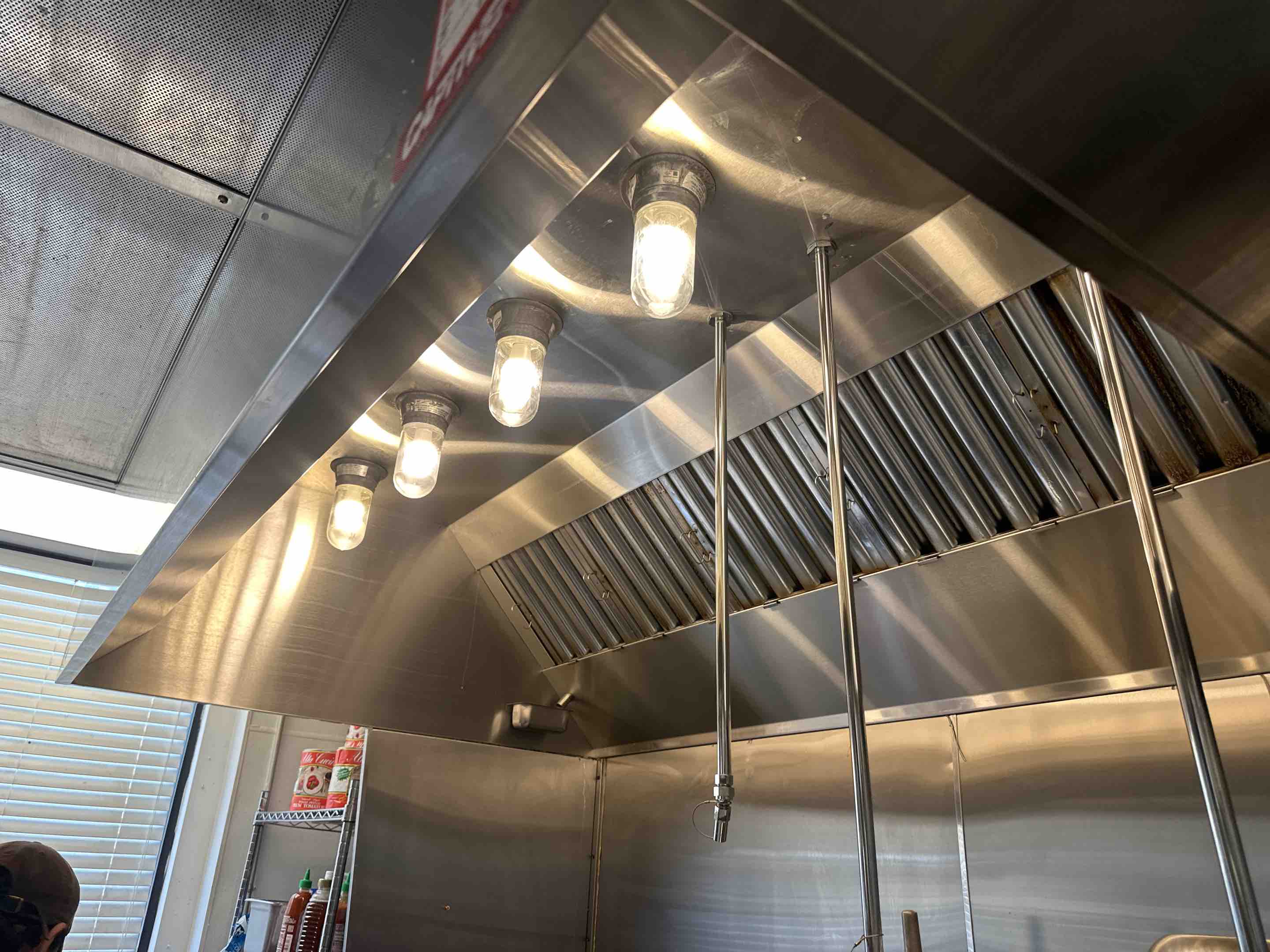 A thorough cleaning of the kitchen hood and fan was performed, ensuring optimal performance and hygiene. The process began with a detailed inspection to identify areas requiring attention. The hood's exterior and interior surfaces were meticulously wiped down to remove grease, grime, and food particles. The fan blades were carefully detached and cleaned to eliminate any buildup, ensuring smooth operation. The final step involved a test run to confirm that the hood and fan were functioning efficiently. This comprehensive cleaning not only enhanced the kitchen's aesthetics but also improved air circulation and safety.