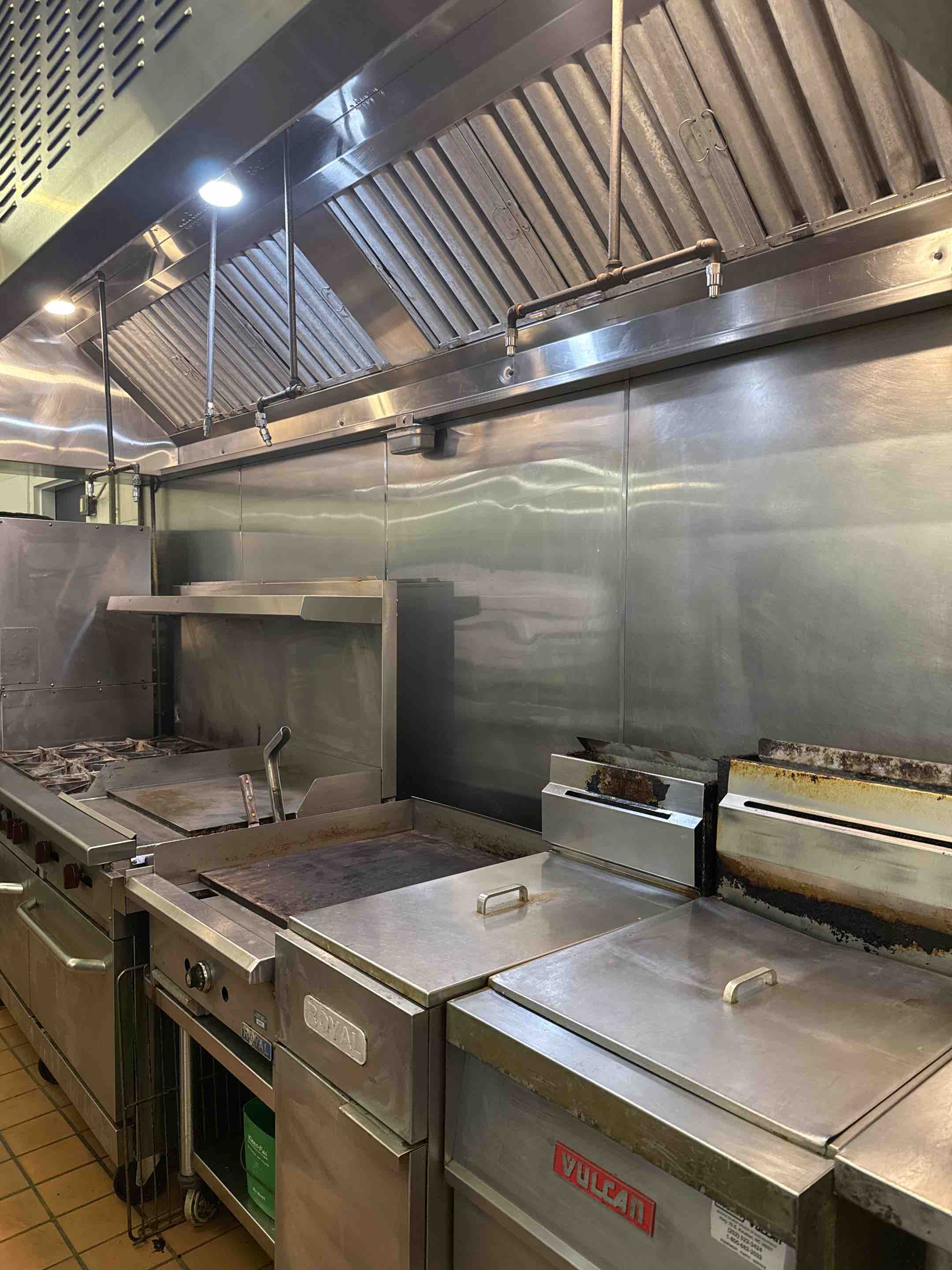 A thorough kitchen hood cleaning was performed, focusing on the intricate components of the ventilation system. The process began with a comprehensive inspection to identify areas with significant grease buildup. Specialized cleaning agents were applied to dissolve accumulated grease and grime. High-efficiency tools were used to scrub and remove stubborn residues from the hood's interior and exterior surfaces. The filters were carefully removed, cleaned, and sanitized to ensure optimal air quality. The entire system was inspected post-cleaning to confirm that all areas were free from grease and contaminants. This meticulous approach not only restored the kitchen hood's functionality but also enhanced its efficiency and safety.