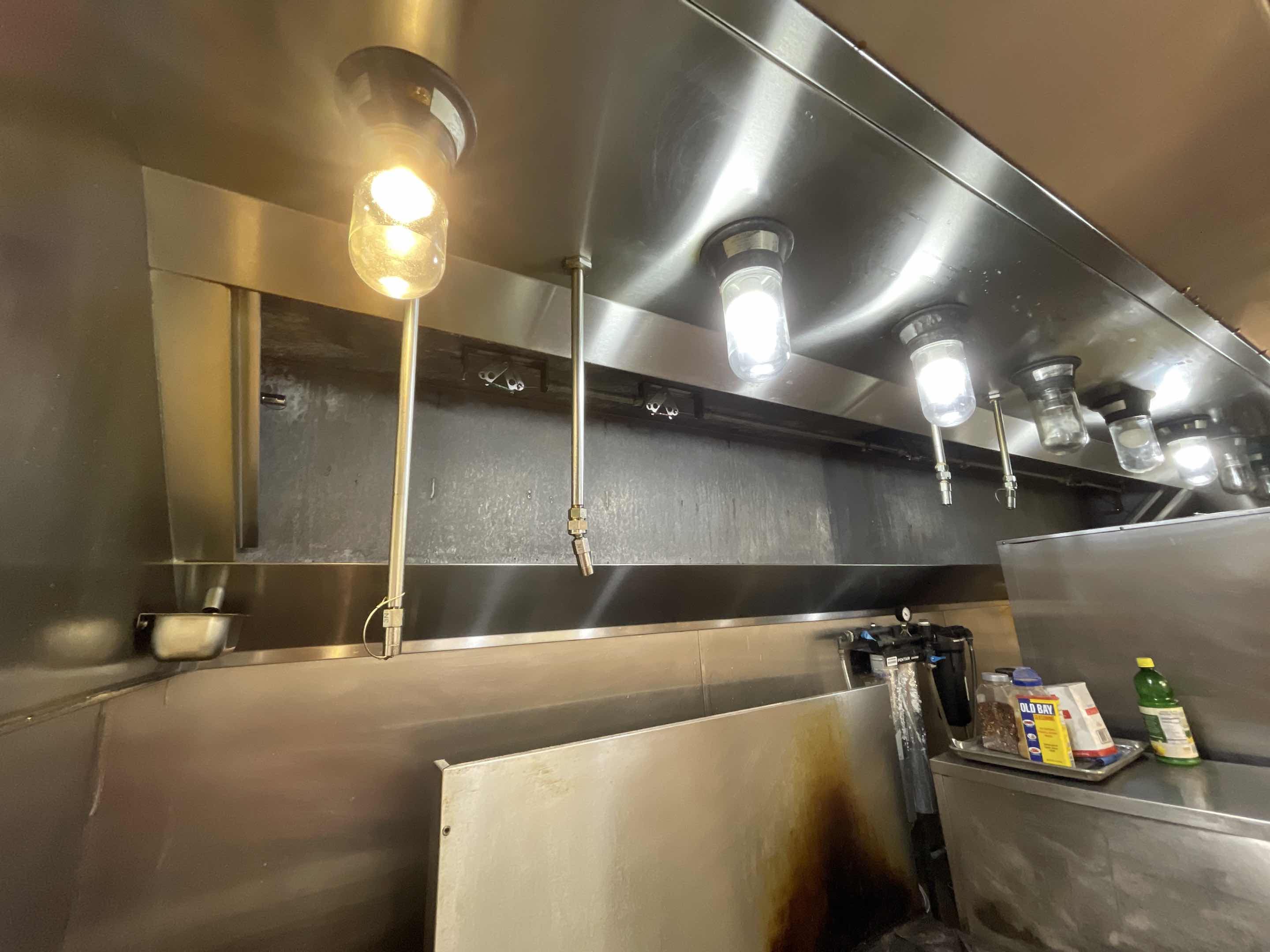 I began by thoroughly inspecting the kitchen hood to assess the level of grease buildup and any potential damage. Using specialized cleaning agents, I meticulously scrubbed the hood's surfaces, paying close attention to hard-to-reach areas. I then cleaned the grease filters, ensuring they were free of any residue. After the cleaning, I inspected the hood's functionality, checking for any obstructions or issues. The final step involved wiping down all surf