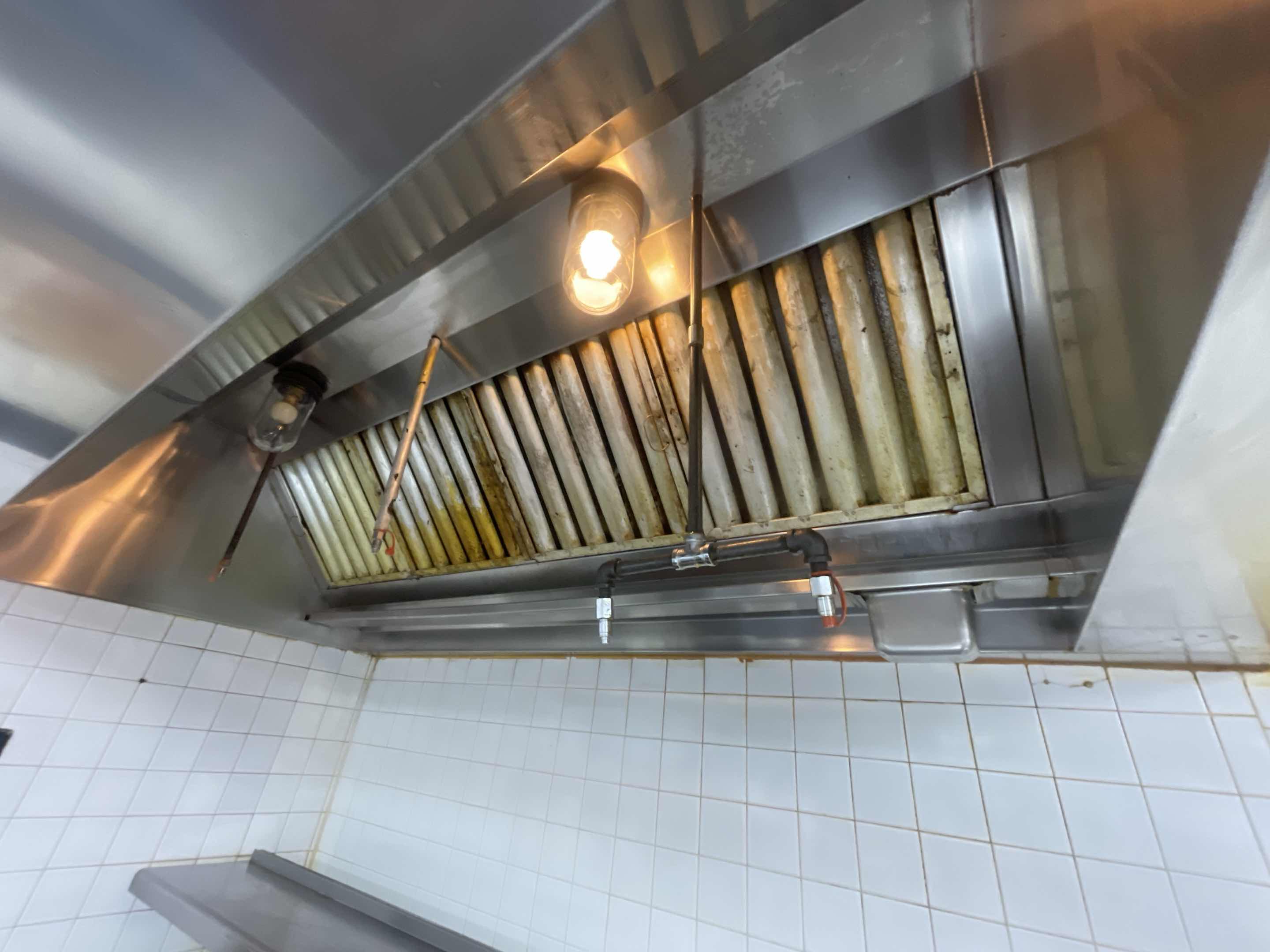 Completed a thorough hood cleaning for the upper deck sports pub. This involved inspecting the entire kitchen hood system, removing accumulated grease and debris from the ductwork, and cleaning the filters. The process included disassembling and reassembling the hood components, ensuring all parts were free of buildup. The filters were washed with a speciali