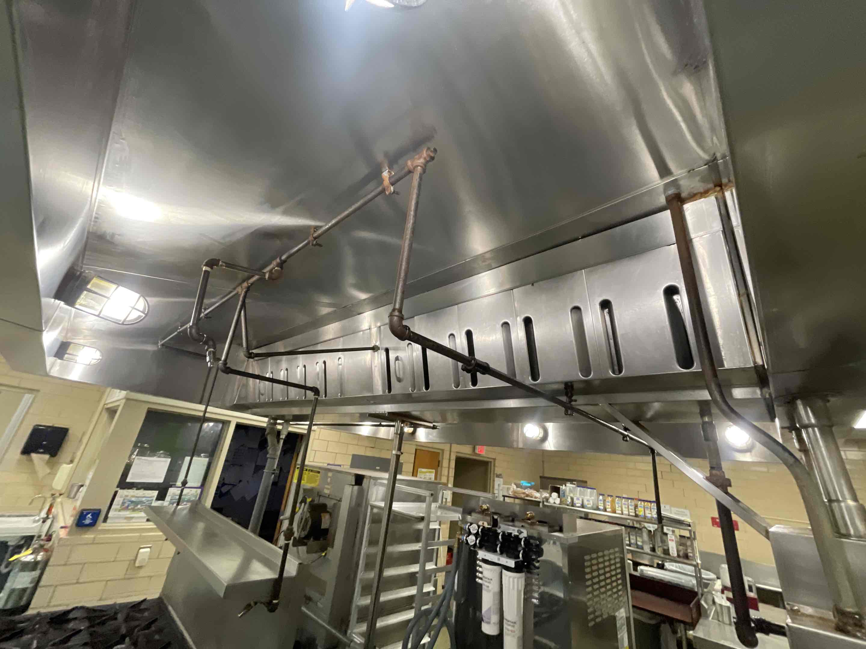 A thorough cleaning and maintenance service was performed on the hospital's exhaust hood system. This involved inspecting, cleaning, and servicing all components, including filters, fans, and dampers, to ensure optimal performance. The cleaning process included removing accumulated grease, debris, and contaminants from the hood surfaces and ductwork. Additionally, lubrication of moving parts and adjustments to ensure proper airflow were conducted. The work was completed with a focus on maintaining a safe and healthy environment, ensuring compliance with health and safety regulations.