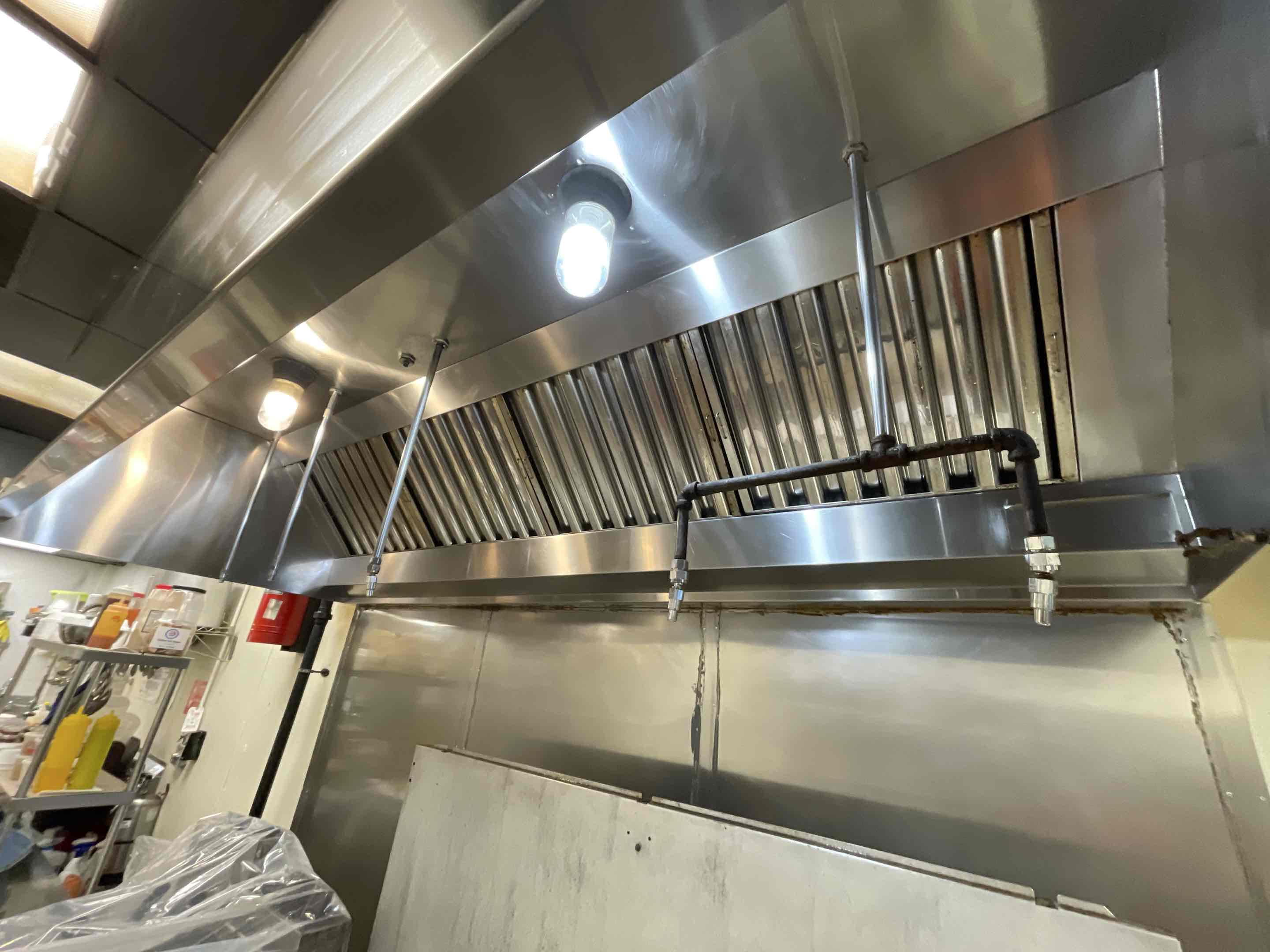 A thorough hood cleaning service was performed for a restaurant, ensuring optimal kitchen ventil